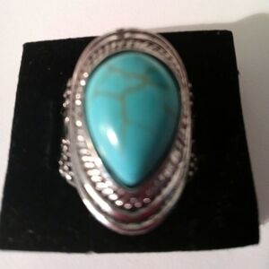 Brand new eye drop turquoise and silver ring one size fits all